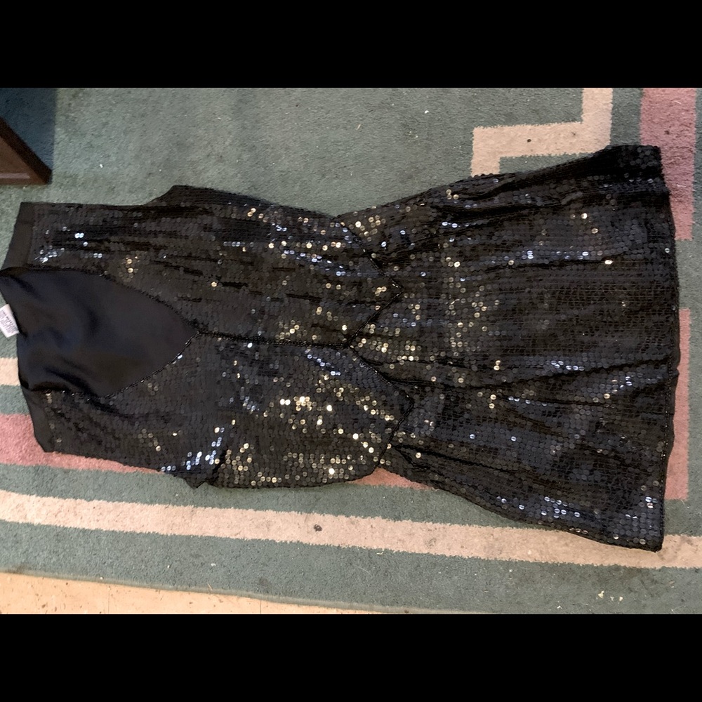 Short 2-piece skirt and vest